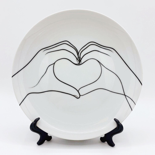 Making Hearts - ceramic dinner plate by Adam Regester